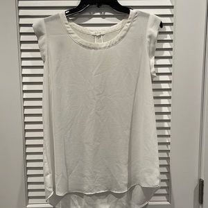 White hi-lo babydoll style blouse